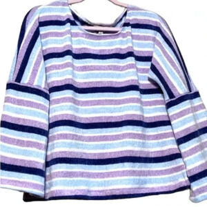 Gorgeous sweater! Perfect for the beach, dinner, casual, you name it!